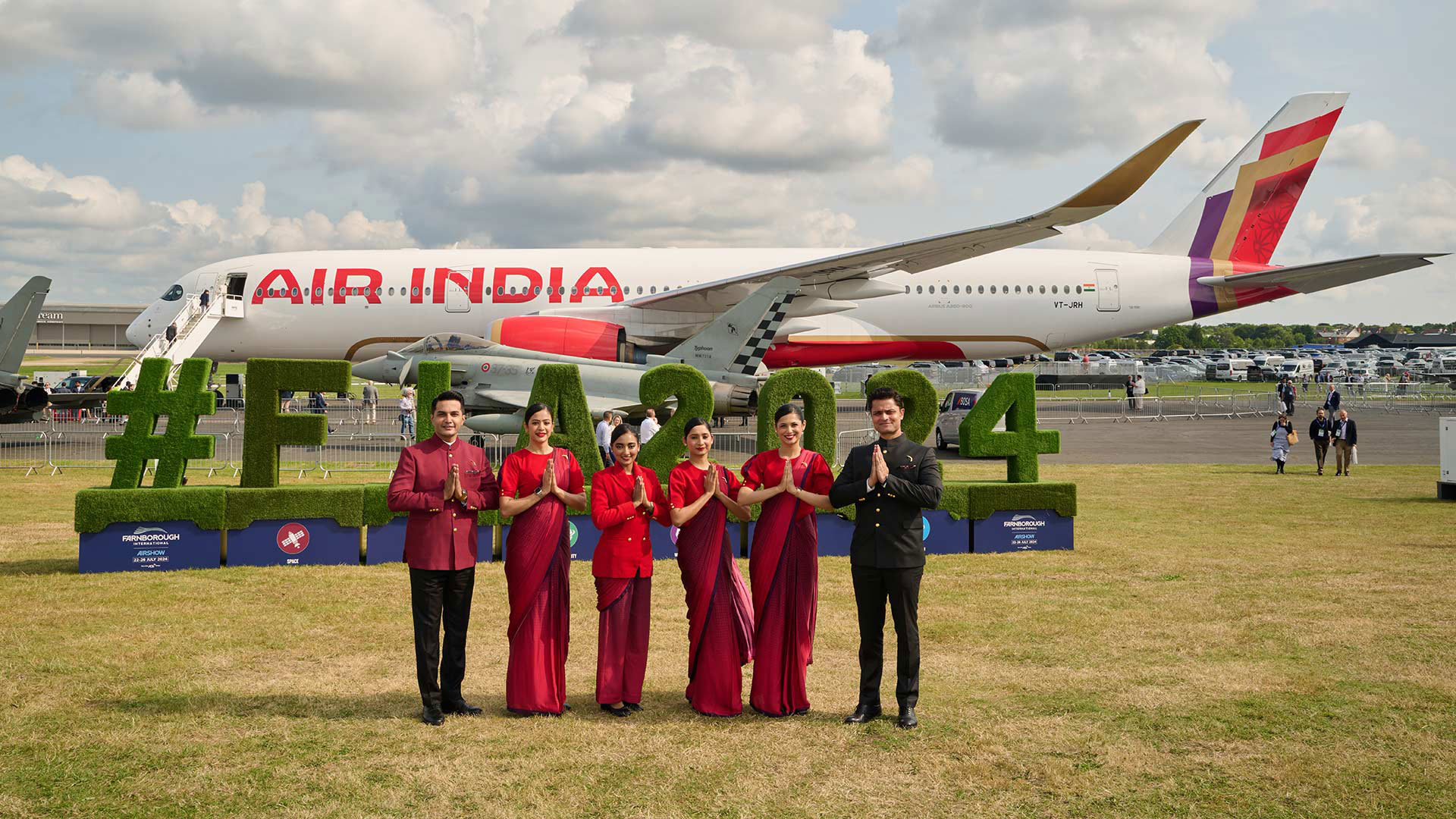 Air India staff in front of the A350 sideways