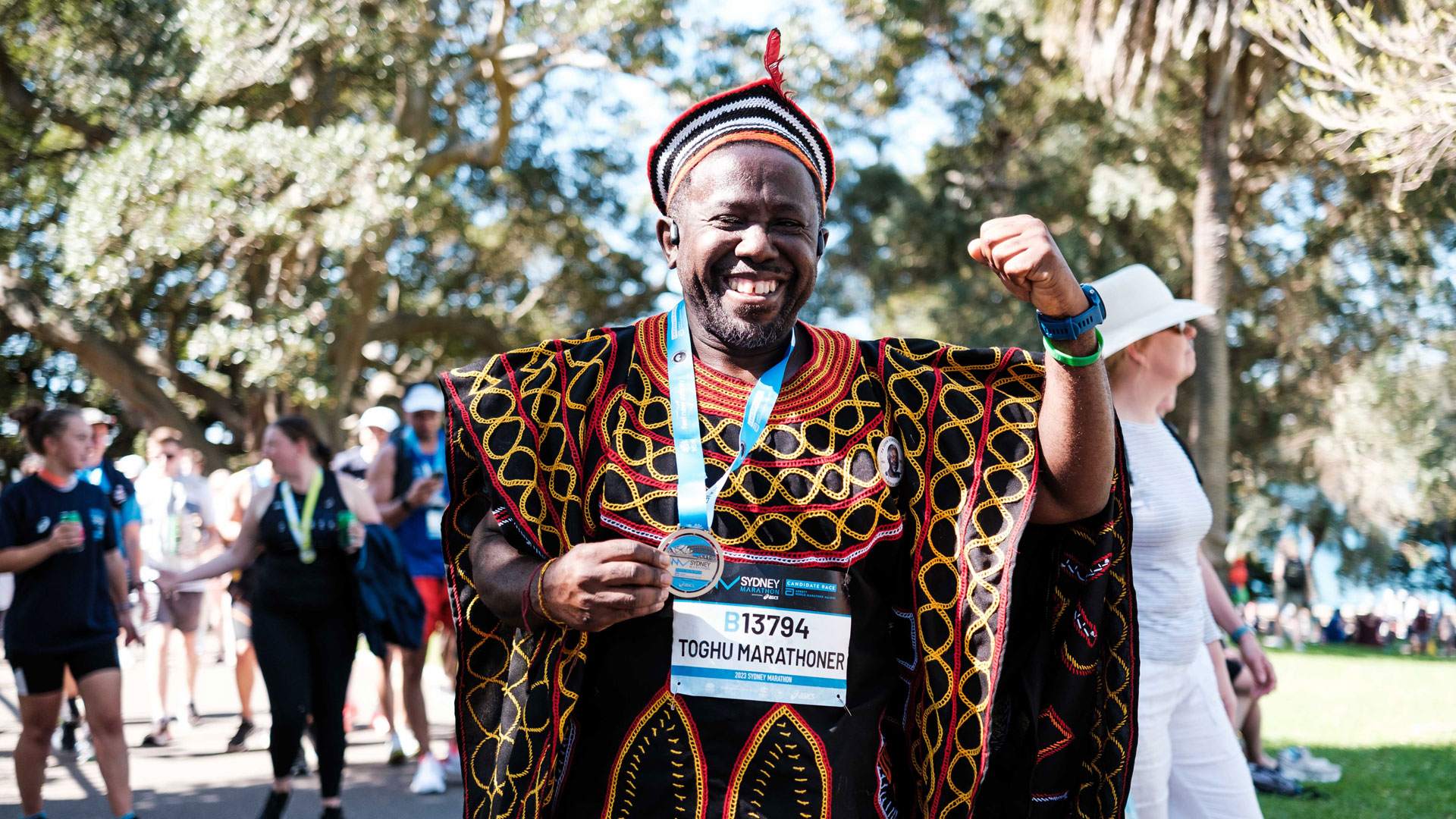 An enthusiastic participant in ethnic gear