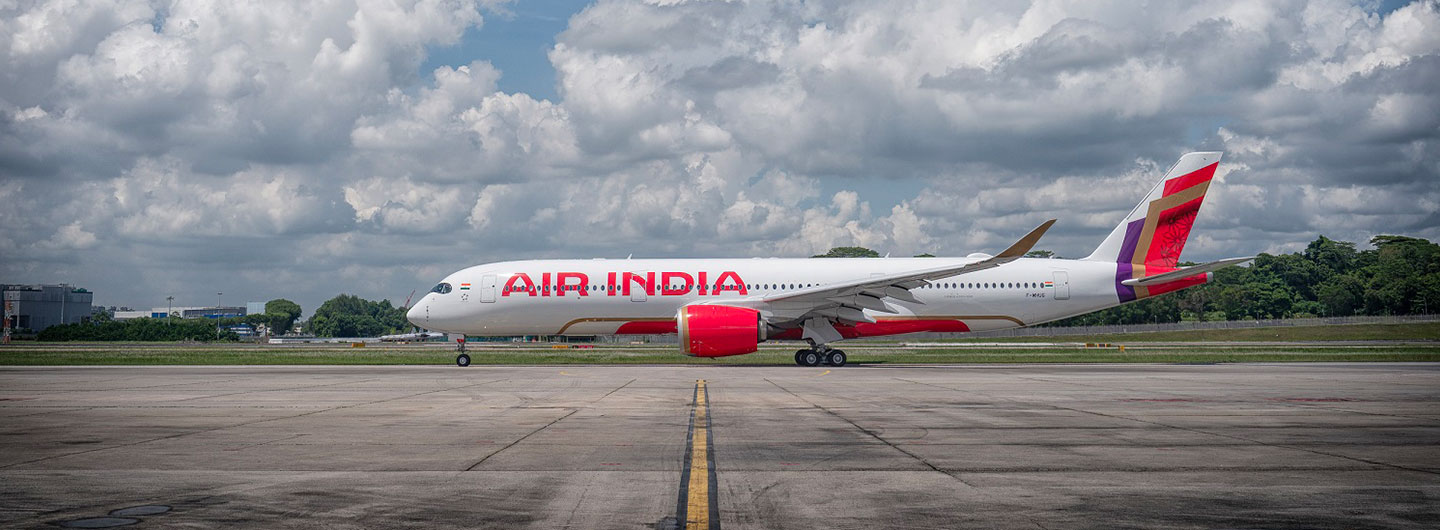 An aircraft in new Air India livery on the tarmac