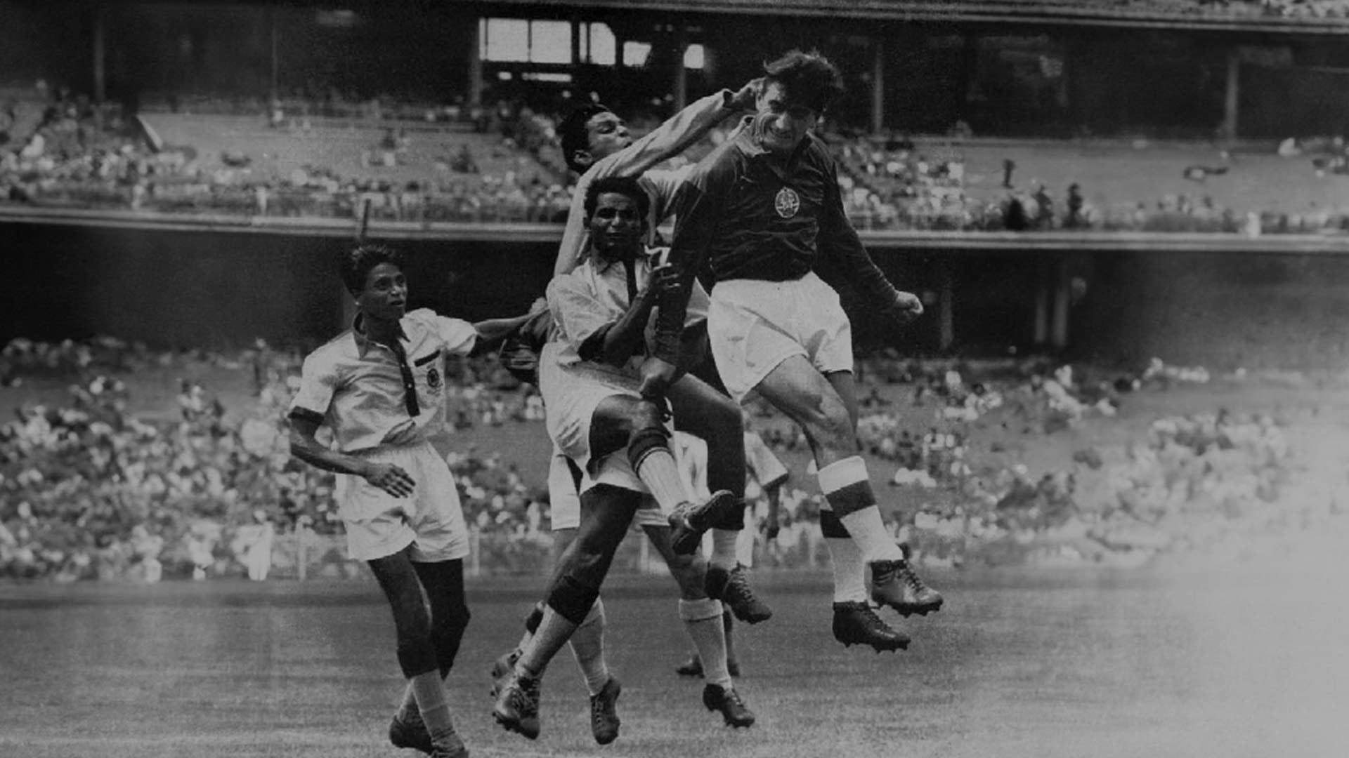 The 1956 Indian football team in action